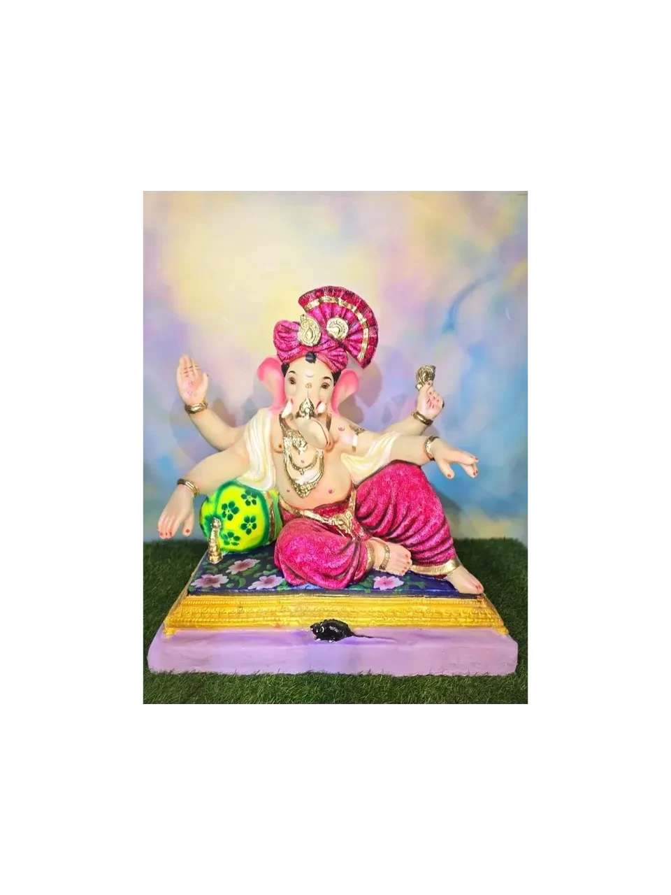 Handcrafted Ganesha idol in vibrant colours